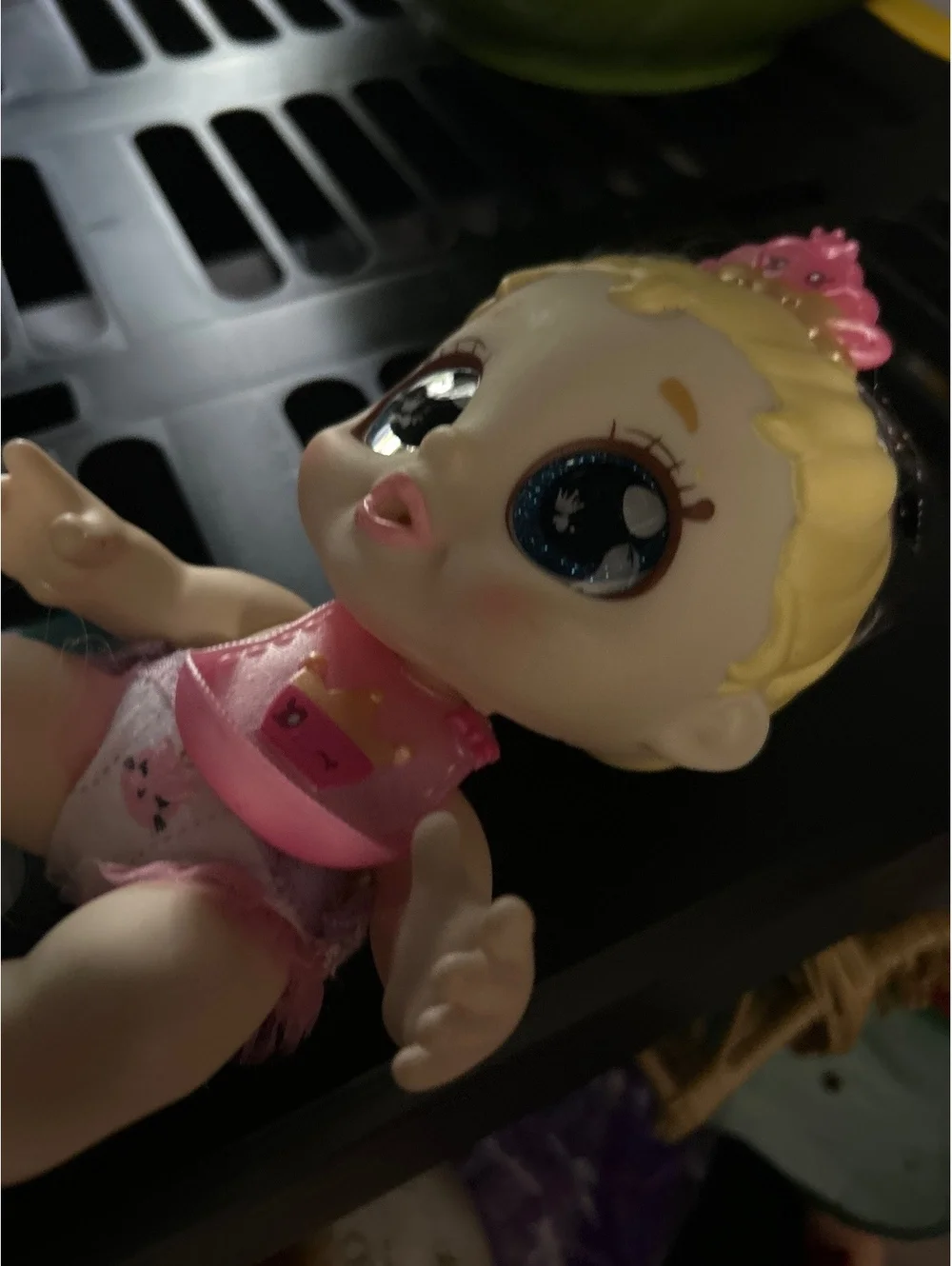 Cute Baby Doll with Blonde Hair and Big Blue Eyes